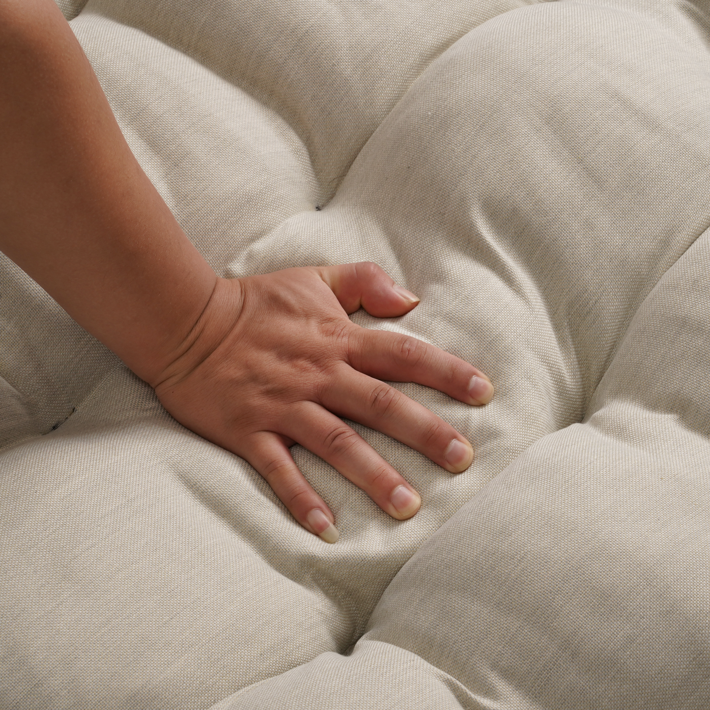 White Iron Frame Beige Cushioned Rattan Rocking Chair